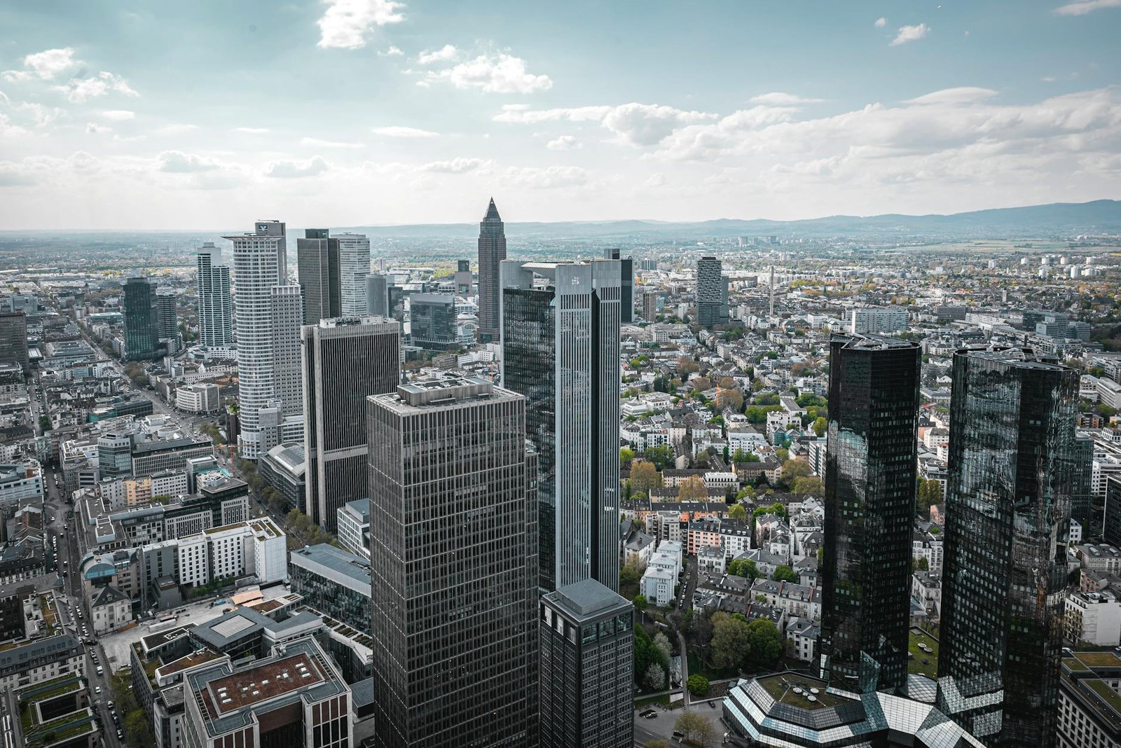 Aerial view of Frankfurt am Main's modern skyline on a clear day.